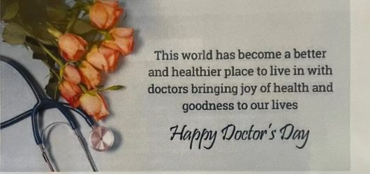 A card with roses and the words " happy doctor 's day ".